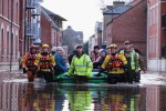 Members of Cleveland Mountain Rescue and soldiers from 2 Battalion The Duke of Lancasters Regiment assist members of the public as they are evacuated. Photo credit: www.ibtimes.co.uk