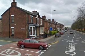 The man was found on Oldham Road, Ashton-under-Lyne, in the early hours of this morning.