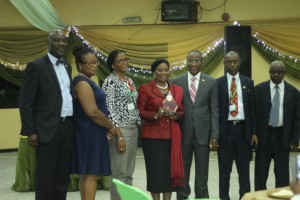 Lagos State Commissioner for Physical Planning & Urban Development, Toyin Ayinde (third from right); with Prof Leke Oduwaye (second from right); a representative of the Deputy Governor of Lagos State, Mrs. Orelope Adefulire (middle); Dr Taibat Lawanson (third from left); Dr Immaculata Nwokoro (second from left); Moses Ogunleye (left); and Prof Toba Olarenwaju (right) 