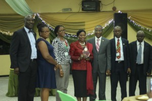 Lagos State Commissioner for Physical Planning & Urban Development, Toyin Ayinde (third from right); with Prof Leke Oduwaye (second from right); a representative of the Deputy Governor of Lagos State, Mrs. Orelope Adefulire (middle); Dr Taibat Lawanson (third from left); Dr Immaculata Nwokoro (second from left); Moses Ogunleye (left); and Prof Toba Olarenwaju (right)