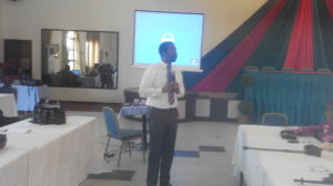 REDD+ Specialist, Ochuko Odibo, addressing the gathering