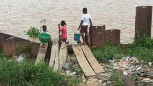 Solid waste dumped beside the Amassoma River. Photo credit: Jack Jackson