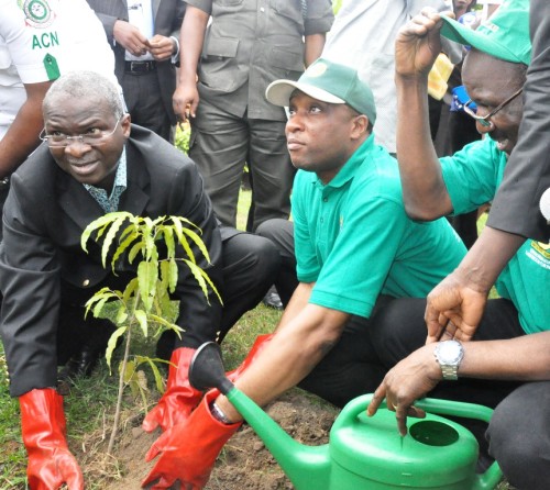 Governor Babatunde Fashola (left) with Environment Commissioner, Tunji Bello, planting a tree to flag-off the 2012 Tree Planting Campaign. Photo credit: strategicindexblogspot.com