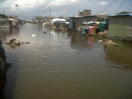 A flooded street in the community