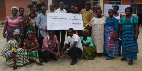 Opume beneficiaries with cheque
