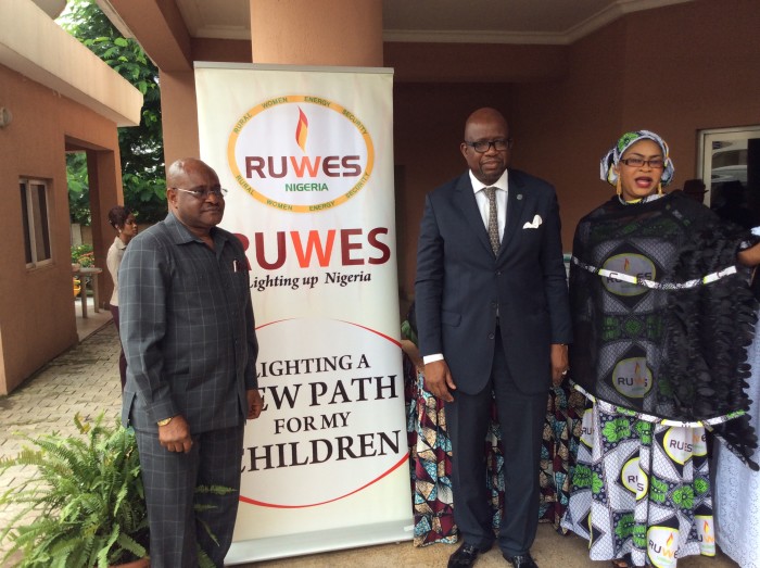 Sir John Odey (left), Mr Daouda Toure (middle) and Mrs Bahijjahtu Abubakar at a function last year: Climate change mitigation initiatives being undertaken by the Abuja-based RUWES Nigeria is helping to keep the earth's warming under 1-5-degree