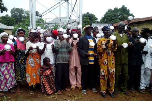Let there be light: Villagers at Tokulo display the solar powered lighting