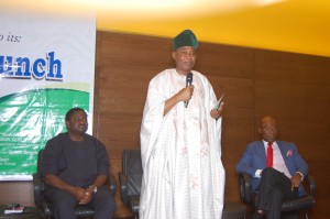 Special Adviser to the President (Media and Publicity), Mr Femi Adesina; former Chairman, Punch Nigeria Limited, Chief Ajibola Ogunshola; and Chairman, Zinox Group, Mr Leo Stan Ekeh, at the formal launching of GOCOP, held at Eko Hotel and Suites, Victoria Island in Lagos 22/10/2015.