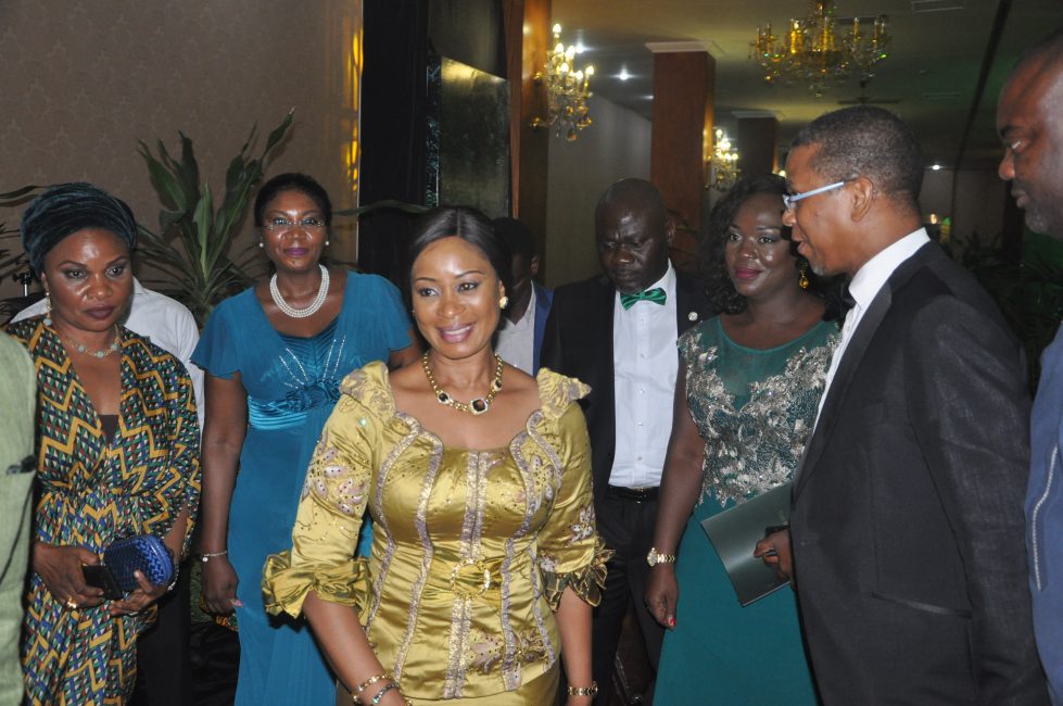 Wife of the Governor of Ogun State, Mrs. Olufunso Amosun (in gold), in the company of Chairman, National Executive Council, Nigerian Conservation Foundation (NCF), Chief Ede Dafinone and other guests during the NCF Green Ball