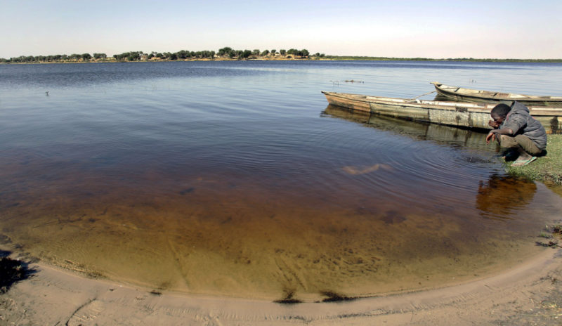 Scientists say the Lake Chad has shrunken by 95 percent over the past 50 years. Photo credit: AP/Christophe Ena