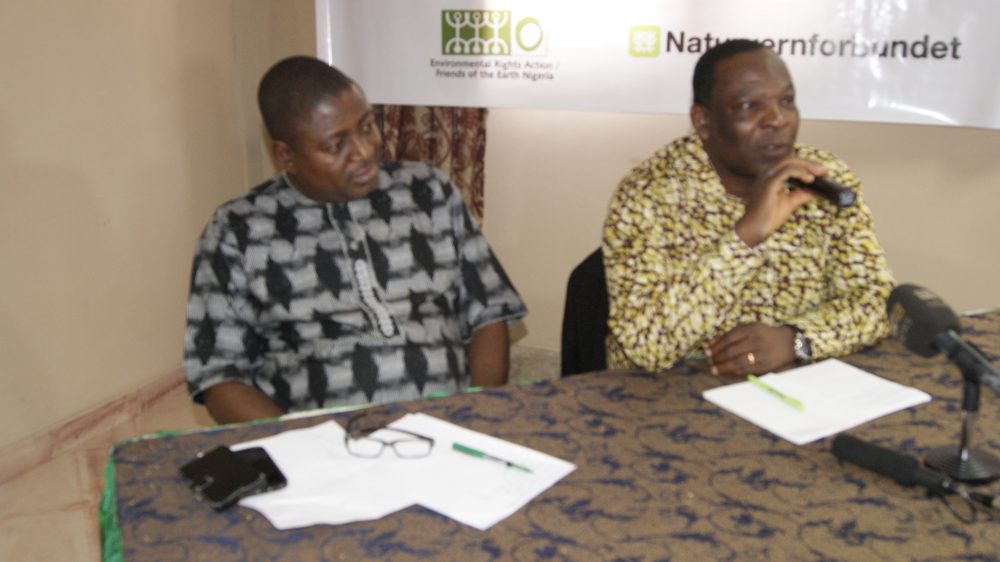 Olabode Akinfemi (left) and Godwin Ojo who were both of the ERA/FoEN, at a Media Debriefing Session in Monday in Lagos