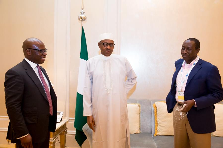 President Buhari with some members of his entourage