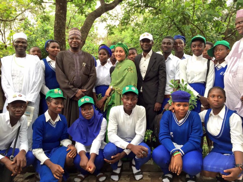 The ministers and senior government officials pose with students