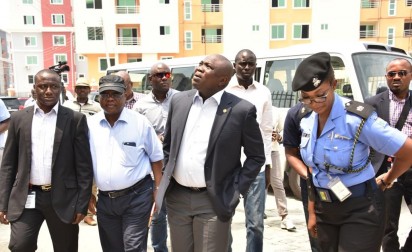 L-R: Lagos State Governor, Mr. Akinwunmi Ambode (2nd left); Divisional Police Officer, Ilasan Police Station, Mrs. Onyinye Onwuanaegbu; Commissioner for Physical Planning & Urban Development, Engr. Wasiu Anifowose and Commissioner for Works & Infrastructure, Engr. Ganiyu Johnson during the Governor’s inspection of the site of the collapsed building in Lekki Gardens at Ikusenla Road, Ikate Elegushi, Lagos, on Tuesday. Photo credit: vanguardngr.com 