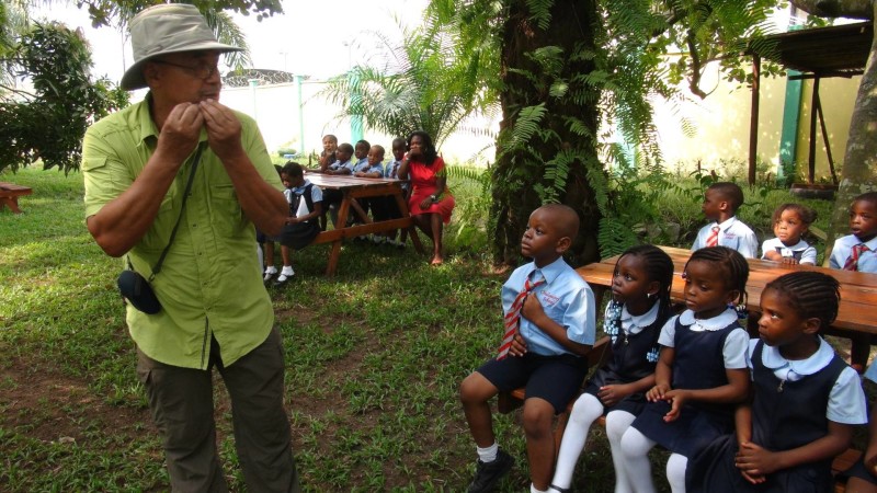 Desmond Majekodunmi with visiting school children at the LUFASI Nature Park