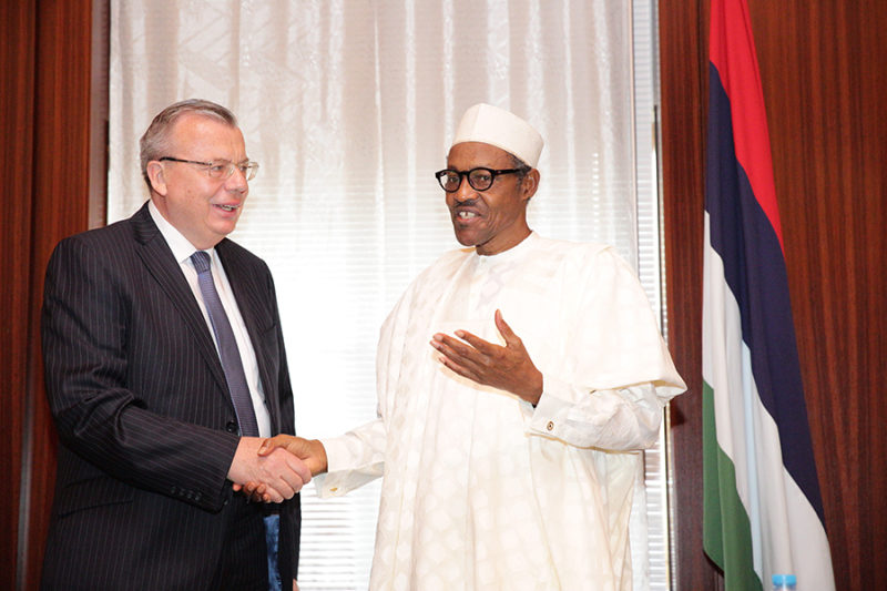 Executive Director of the UN Office on Drugs and Crime (UNODC), Yury Fedotov, with President Muhammadu Buhari 