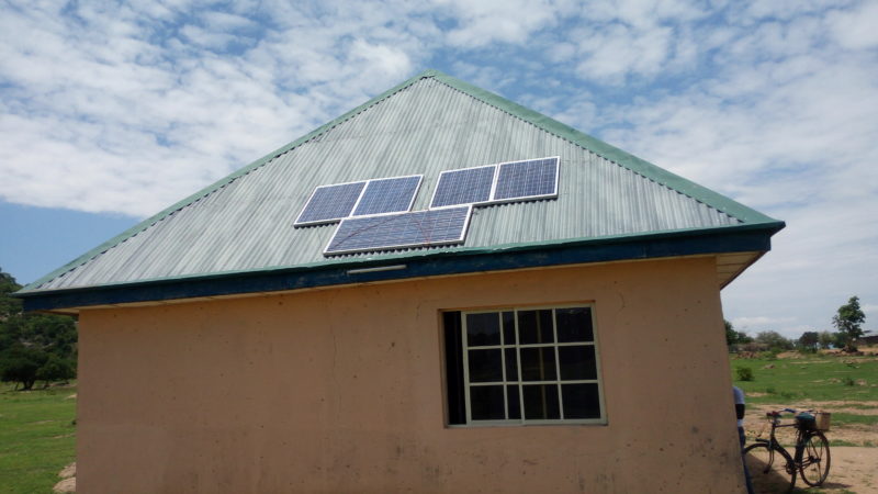 Solar panels on the roof of a building powering fridge and lighting systems in a community in Hong LGA in Adamawa State