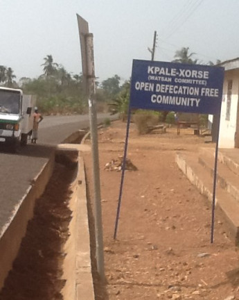 A sign post displaying the ODF status of the community