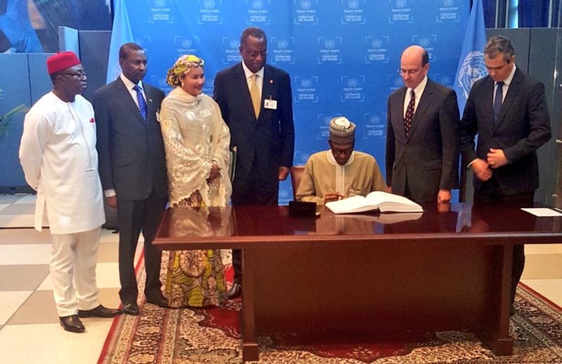 President Buhari of Nigeria signs the global treaty. President Buhari with R-L: Mr. Stephen Mathias, Assistant Secretary-General for Legal Affairs, United Nations; Mr. Santiago Villalpando, Chief of the Treaty Section, OLA, United Nations; Minister of Foreign Affairs, Geoffrey Onyeama; and Minister of Environment, Amina Mohammed as he signs Paris Agreement on Climate Change at the sidelines of the UN General Assembly in New York September 22, 2016.