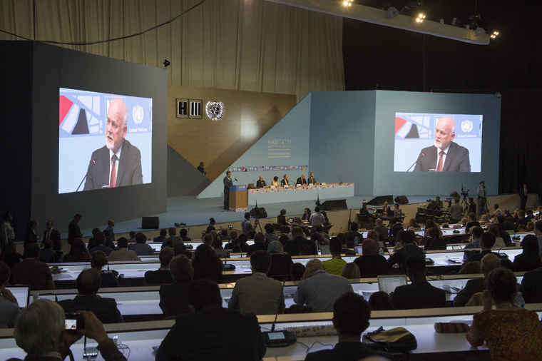 Peter Thomson (on big screens), President of the General Assembly 71st Session, delivers remarks at the opening of the Second World Assembly of Local and Regional Governments in Quito, Ecuador. Photo credit: UN Photo/Eskinder Debebe