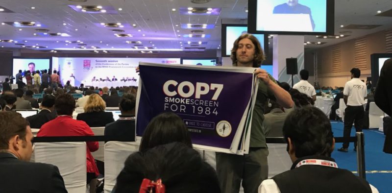 A Students For Liberty activist carries a protest sign at the World Health Organization’s Framework Convention on Tobacco Control 7th Annual Conference of the Parties (COP7) in New Delhi, India.