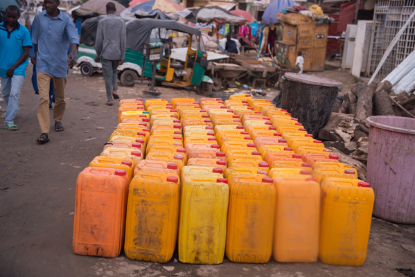 Gallons of water lined up for sale in the Garki Village Primary Health Centre which is required because of lack of clean water supply to the centre. Abuja, Nigeria