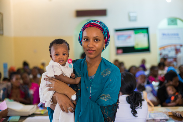 Aisha Bello, 24, and her new born baby Sa’adat (3 months old) came for post natal check up and routine immunisation at the Family Clinic Area 2 Primary Health Centre, Abuja, Nigeria