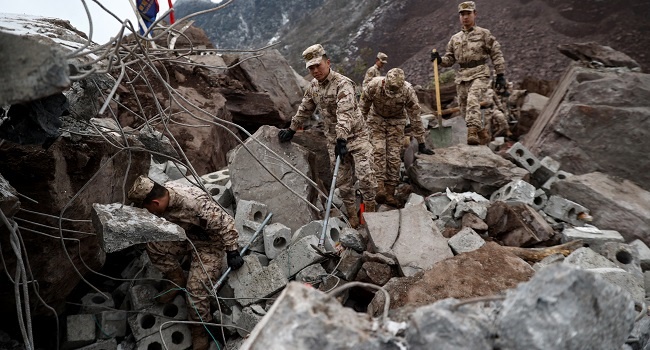 Over 40 trapped, eight dead in China landslide